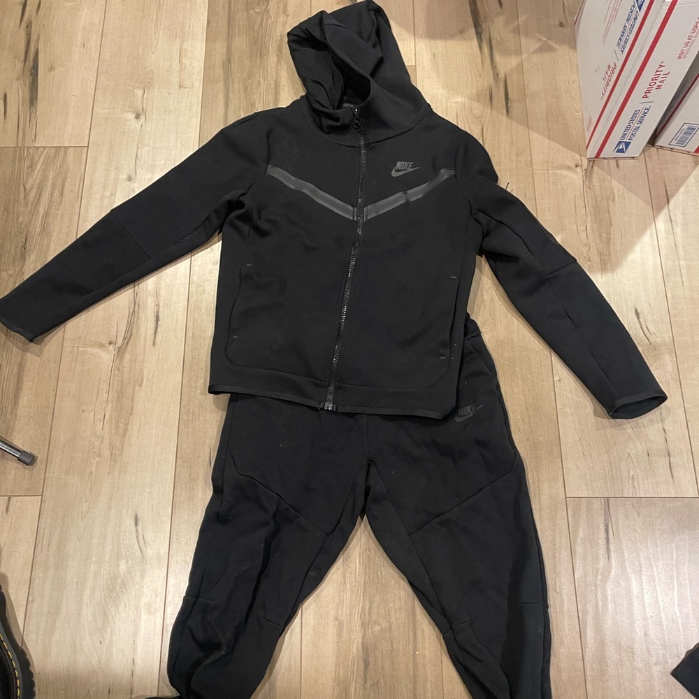 Nike tech. Only worn once by the former owner. willing to lower price. LMK